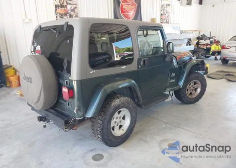 2004 Jeep Wrangler Sahara from USA, damaged, VIN 1J4FA59S34P740481
